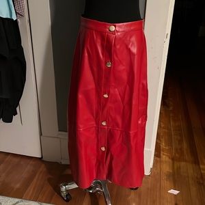 Red faux leather midi skirt